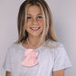 Girl with pink facemask around her neck  facemasks forsale facemasksaustralia facemaskstrap SheikeStik